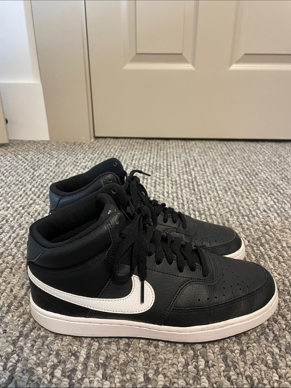 Nike Black and White Mid-Top Sneakers